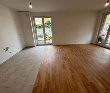 Attraktive 4-Zimmer Wohnung mit Terrasse und Garten zu vermieten! - Photo 1