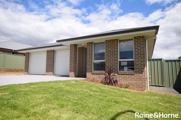 Stylish 4-Bedroom Home Designed for Comfort & Convenience - Photo 1