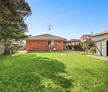 Comfortable 3-Bedroom Brick Home - Photo 6