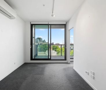 Modern Scandinavian-Style One-Bedroom + Study Apartment Moments fro... - Photo 4