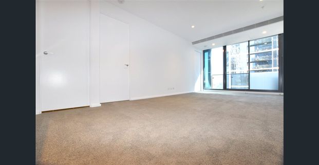 Brilliantly Positioned Two Bedroom with Expansive Living Spaces! - Photo 1