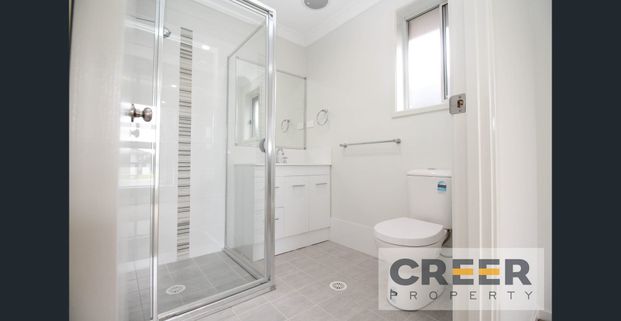 Modern and Spacious 3 Bedroom Home - Photo 1