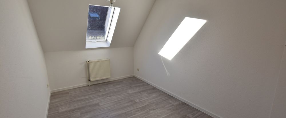 Zentral gelegene Obergeschosswohnung in Warsingsfehn - Foto 1