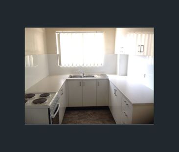 UPDATED UNIT IN GREAT LOCATION! - Photo 2