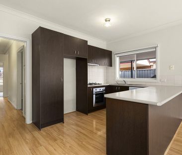 Bright and Spacious Family Home in Prime Location - Photo 1