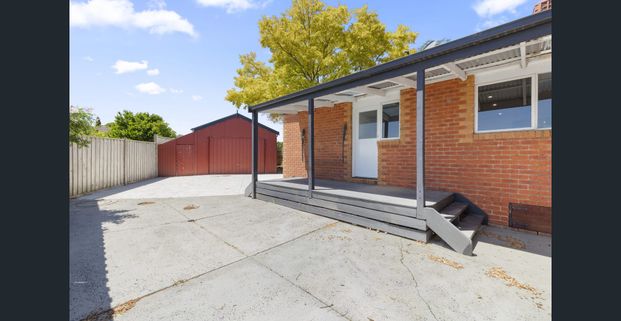 Beautifully updated home with SO MUCH PARKING! - Photo 1