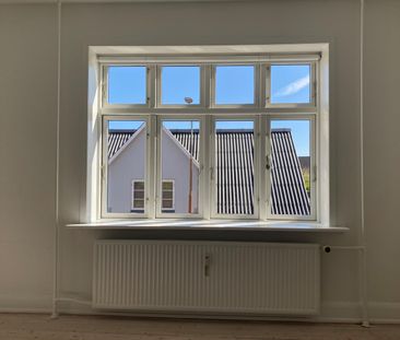 Lys og hyggelig 2-værelses med charmerende gårdhave – beliggende i ... - Photo 2