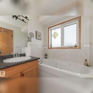 4 bed, 3 bath, Fully Finished Bi-level in Miller! - Photo 4