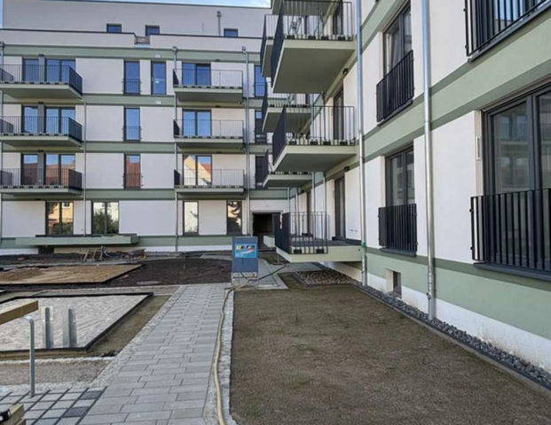 Neubau: gut geschnittene Wohnung im Dachgeschoss mit Stellplatz - Foto 1