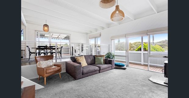 Spacious Coastal Haven with Poolside Living - Photo 1