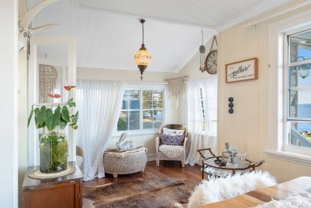 Luxury Waterfront Queenslander with Dual Living & Resort-Style Entertaining - Photo 2