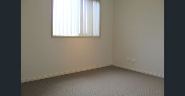 MODERN TOWNHOUSE PACKED WITH FEATURES! - Photo 1