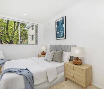 Renovated Three-Bedroom Retreat in Ultra Convenient Location Moment... - Photo 6