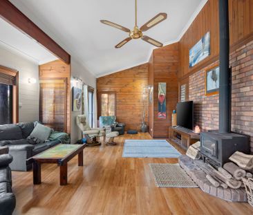 TOP OF THE TREE TOPS HOME WITH LAKE VIEWS - Photo 1