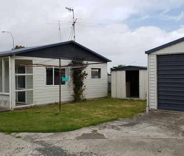 Renovated 2 Bedroom Unit with shared garage - Photo 3