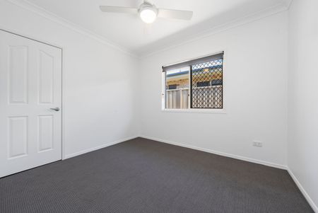 Coastal Comfort Awaits: Your Modern Haven in Woody Point - Photo 5