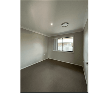 Modern 4-Bedroom Home with Comfort & Convenience - Photo 1