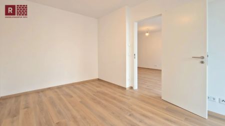 Moderne EG-Wohnung mit Terrasse, hochwertiger Ausstattung und großen Keller in zentraler Lage - Photo 3