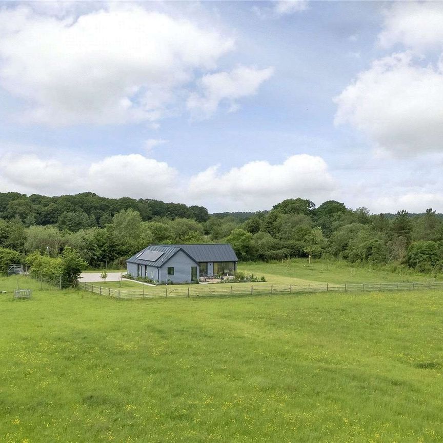 A highly energy efficient and stylish three bedroom single storey property with beautiful views, completed in 2023. - Photo 1