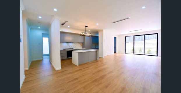 Beautifully Designed New Home in a Peaceful Urban Setting - Photo 1