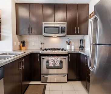 WALK TO SKYTRAIN FROM THIS 2 BED/2 BATH IN KLAHANIE - Photo 1