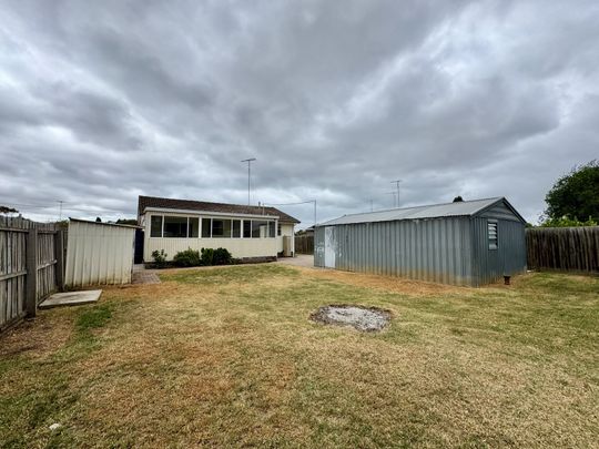 Updated Home with Spacious Yard and Prime Location - Photo 1