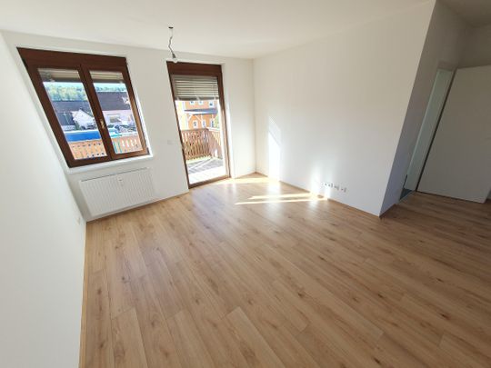 Geförderte Wohnung mit Balkon im 1. Stock - Foto 1