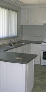 Neat Low Maintenance Unit! - Photo 3