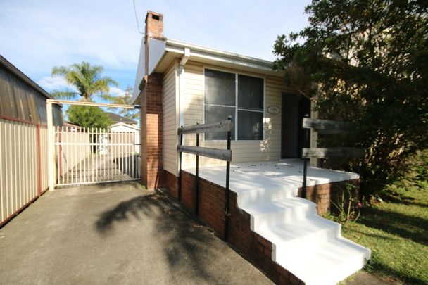 Neat & Spacious Home in a Convenient Revesby Location - Photo 1