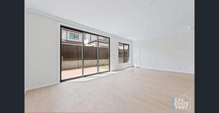 New 4-Bedroom Family Home with Downstairs Bedroom | Prime Location - Photo 3