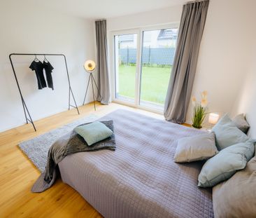 Neubau-Terrassenwohnung mit Garten und Stellplatz! - Foto 3