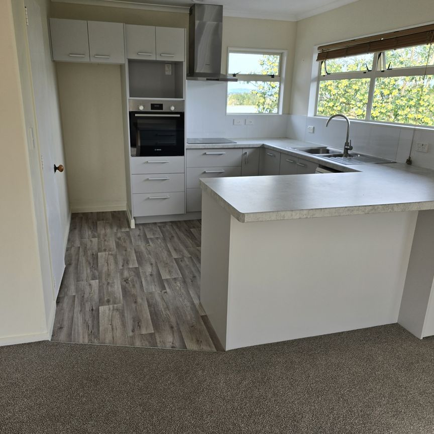 Easy Care Living! - Photo 1