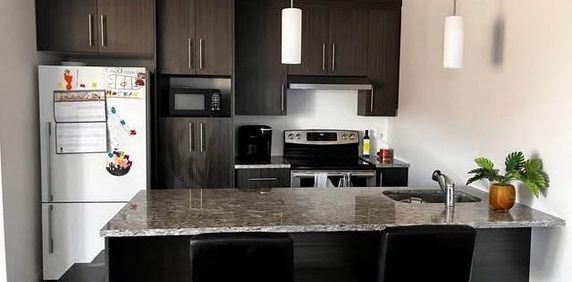 Appartement style condo - Photo 2