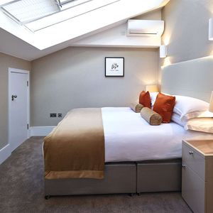 An impressive and modern one bedroom, one bathroom apartment on the 1st floor of this modern building across the street from the iconic Harrods store. - Photo 2