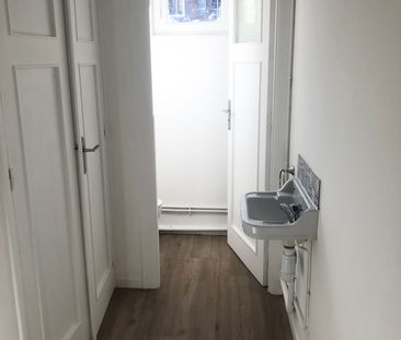 T3 EN HYPER CENTRE AVEC CAVE - Photo 5