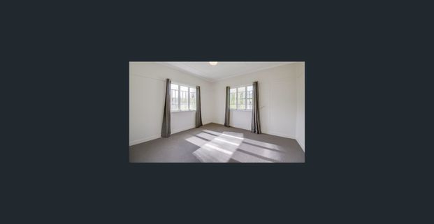 Neat and Tidy Home in Booval! - Photo 1