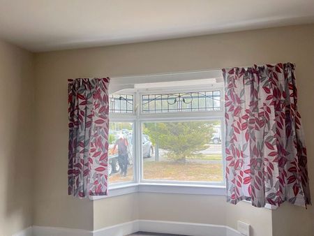 A home with renovations done with new carpet - Photo 3