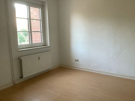 Schöne Erdgeschosswohnung in denkmalgeschütztem Haus! - Photo 4