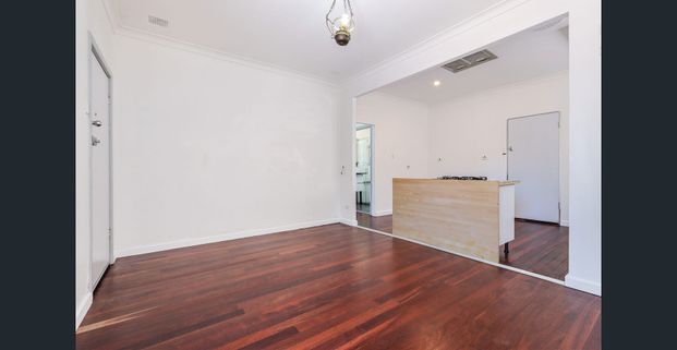 NEAT AND TIDY 4X1 HOME WITH AMPLE PARKING - Photo 1