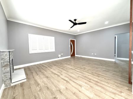 Fully Renovated Three-Bedroom Home with Carport Parking - Photo 2