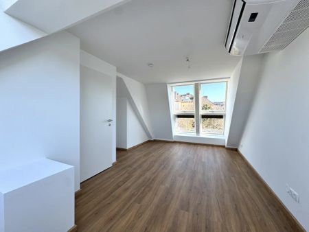 Hochwertige Dachgeschosswohnung mit Terrasse sowie Klimaanlage - Erstbezug - Unbefristet - Photo 3