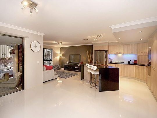 Immaculately Presented Split-Level Family Home with Resort-Style Entertaining - Photo 1
