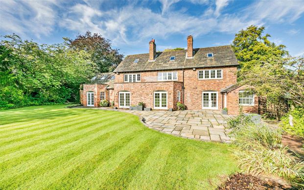 Superb contemporary gated home with gym, sauna, and fabulous south facing gardens, well located on the outskirts of Wilmslow and Alderley edge. - Photo 1