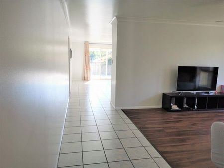 Spacious timber and tile floor. - Photo 2