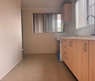 1st Floor Renovated 3 Bedroom Unit - Photo 6