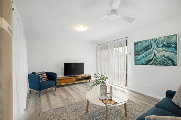 LIGHT, BRIGHT AND READY TO ENJOY! - Photo 1