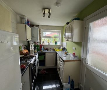 A mid terraced property consists of living room with separate dinin... - Photo 4