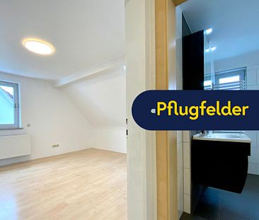 Gemütliche Dachgeschosswohnung mit großer Einbauküche - Foto 6