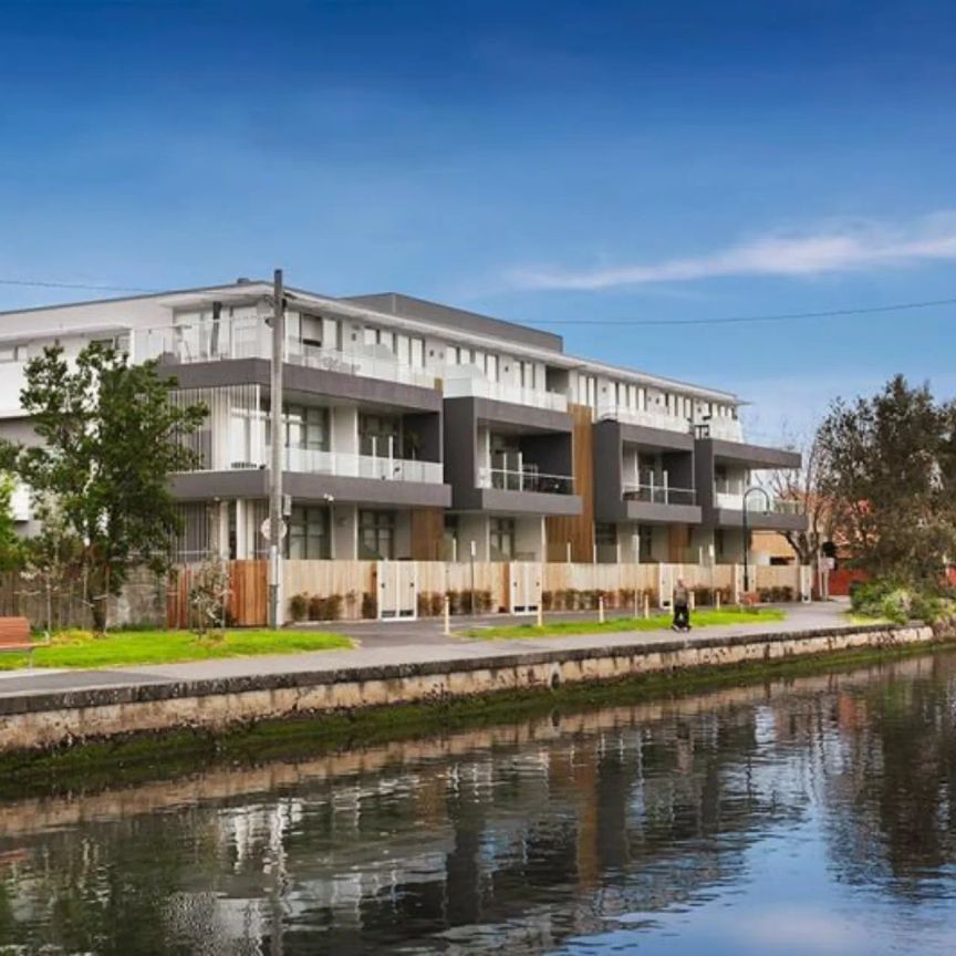 Modern Living with Canal Views & Beachside Lifestyle - Photo 1