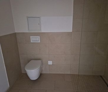 Moderne Wohnung in Top-Lage: 2 Zimmer, Terrasse, Fußbodenheizung, Einbauküche und Garage - Jetzt mieten - Photo 1